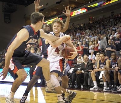 Matthew Dellavedova averages 17.4 points and a WCC-leading 6.7 assists for Saint Mary’s. (File)