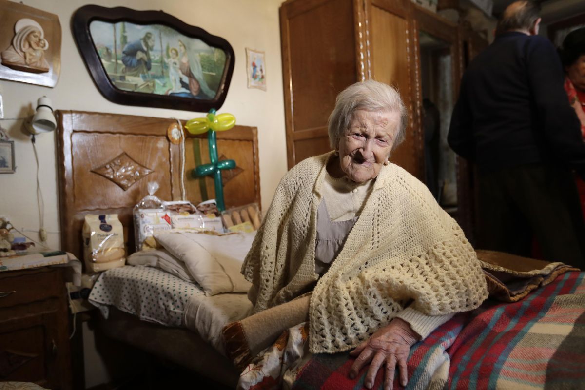 In this Tuesday, Nov. 29, 2016 photo, Emma Morano sits in her home on the day of her 117th birthday in Verbania, Italy. An Italian doctor says Emma Morano, at 117 the world