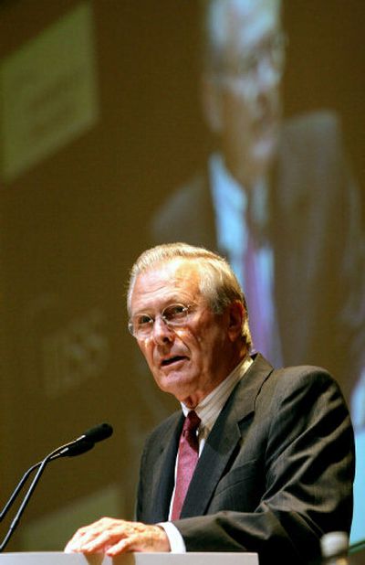 
U.S. Secretary of Defense Donald Rumsfeld delivers his keynote speech Saturday at the 5th Asia Security Summit.
 (Associated Press / The Spokesman-Review)