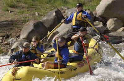 
Rafters run the Smelter Rapids on the Animas River through Durango, Colo., in May. Tourism officials from Oregon to Arizona's Grand Canyon National Park say they are having one of the best summer seasons in years.
 (File/Associated Press / The Spokesman-Review)