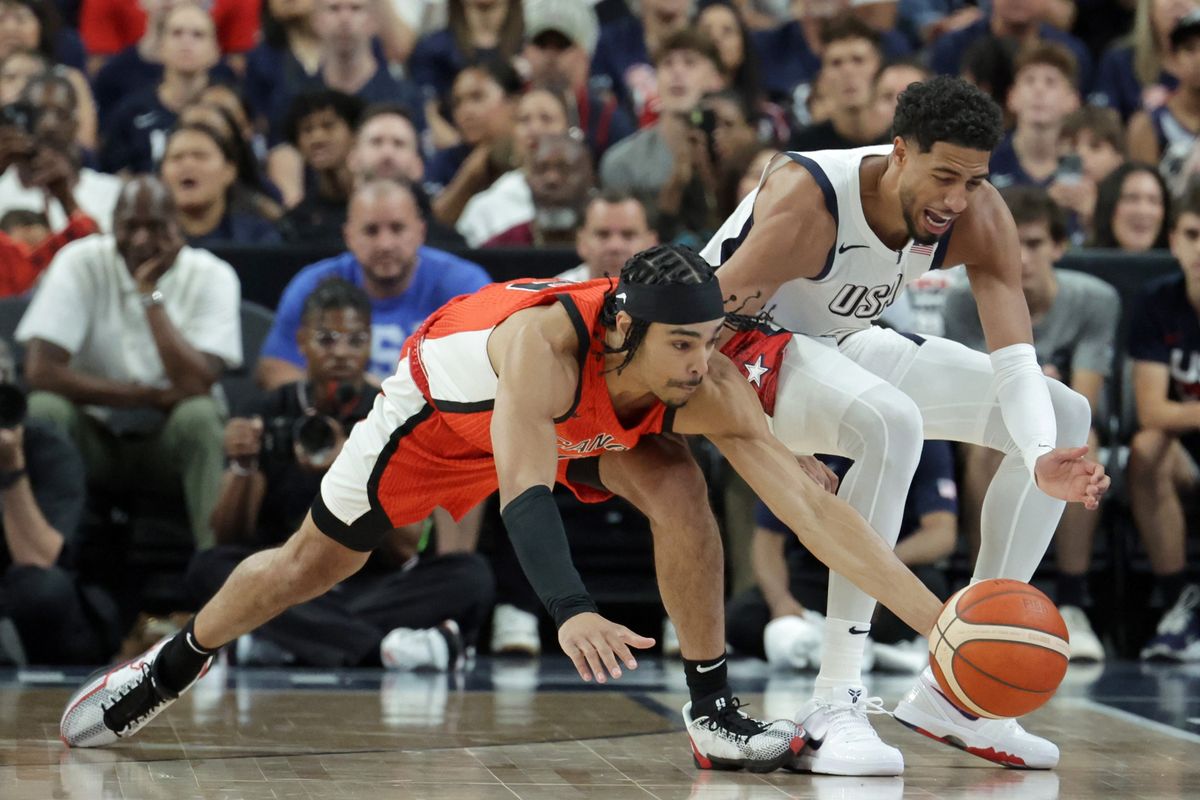 Team Canada’s Andrew Nembhard steals the ball from Team USA’s Tyrese Haliburton during an exhibition on July 10 at T-Mobile Arena in Las Vegas.  (Getty Images)