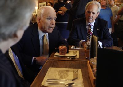 Sen. John McCain stops to talk with small business leaders Thursday at a German restaurant in Columbus, Ohio.  (Associated Press / The Spokesman-Review)