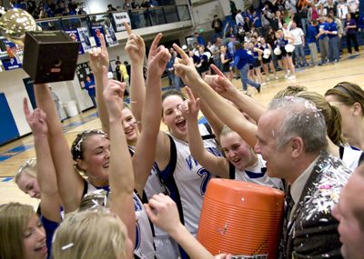 Coach Dale Poffenroth and his Coeur d’Alene team celebrate beating Post Falls.Special to  (Bruce Twitchell Special to / The Spokesman-Review)