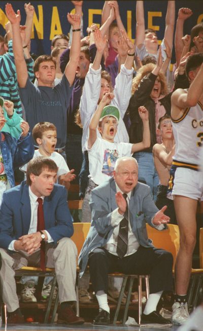 Naselle coach Lyle Patterson, right, leads cheers during 1992 State B tourney. (File)