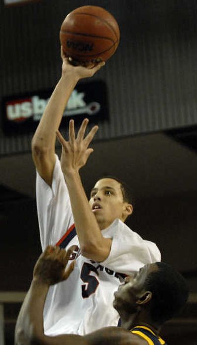 
Bulldogs freshman Austin Daye scores over UC Riverside's Aaron Scott. Associated Press
 (Associated Press / The Spokesman-Review)