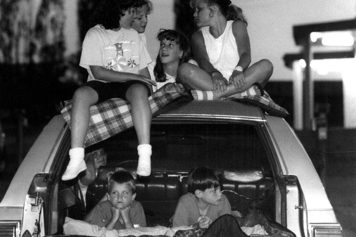 A carload of kids get ready for action on a recent night at the North Cedar Drive-in in 1990. (Colin Mulvany / The Spokesman-Review)