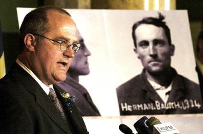 
Drew Briner, grandson of Hermann Bausch, who was one of 78 Montana men and women convicted of sedition during World War I, attends a pardons ceremony in Helena on Wednesday. 
 (Associated Press / The Spokesman-Review)