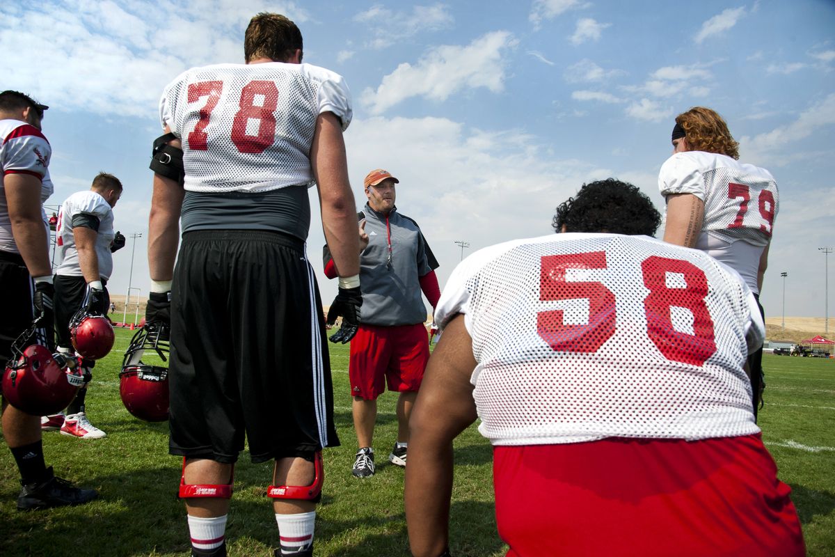 When Eastern Washington offensive line coach Aaron Best talks (or yells), you can bet every offensive lineman at practice is listening. (Dan Pelle)