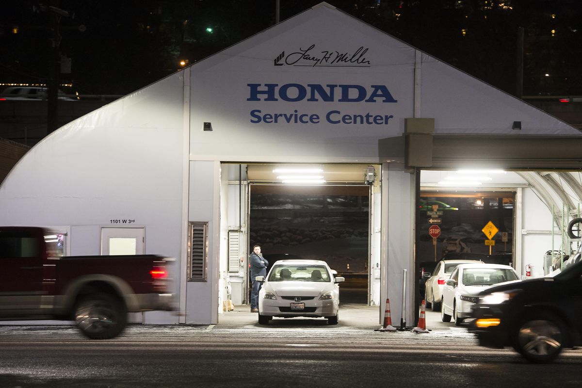 The Spokane City Council has denied a request from car dealership Larry H. Miller to vacate Madison Street between 2nd and 4th avenues. The temporary service center structure will have to eventually be removed. (Colin Mulvany / The Spokesman-Review)