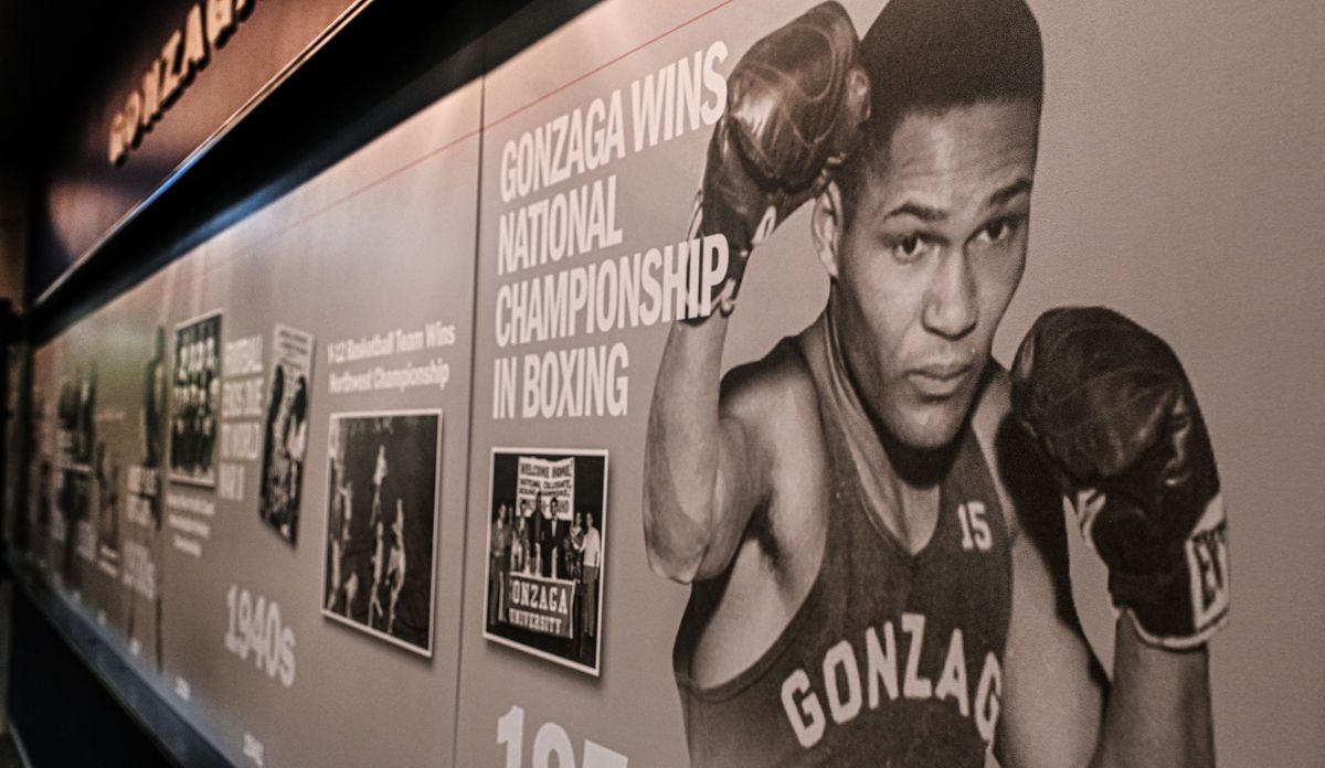 Carl Maxey is part of the athletic timeline on display in the Martin Centre at Gonzaga University on June 10. While attending Gonzaga Law School, he compiled a 32-0 record. In 1950, he and his teammates gave Gonzaga its first NCAA title by co-winning the National Collegiate Boxing Championship. He became the first African American in Spokane to pass the bar exam and Spokane’s first prominent Black attorney. (Kathy Plonka/The Spokesman-Review)