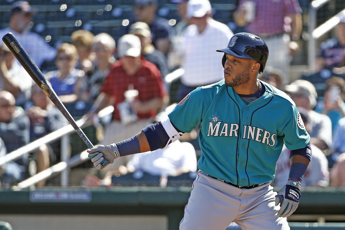 Seattle Mariners second baseman Robinson Cano bats against the Cleveland Indians during the first inning of a spring training baseball game Wednesday, March 1, 2017, in Goodyear, Ariz. (Ross D. Franklin / Associated Press)