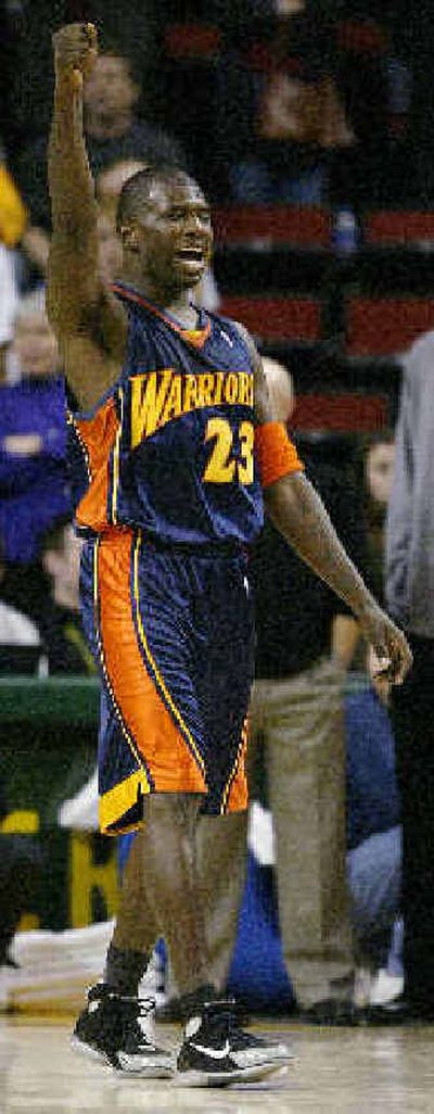 
Golden State Warriors forward Jason Richardson celebrates a late foul called on the SuperSonics. 
 (Associated Press / The Spokesman-Review)