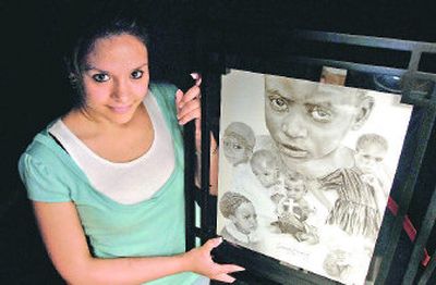 
Sarah Kimbley of Coeur d'Alene High School won a congressional art contest for her pencil drawing of African children she saw in photos from a missionary. She, her mother and her younger sister will be flown to Washington, D.C., for the unveiling. 
 (Jesse Tinsley / The Spokesman-Review)
