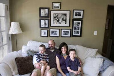 
The Sklut family has settled into a home on the South Hill. From left are Jack, John, Amy and Declan.
 (Christopher Anderson/ / The Spokesman-Review)