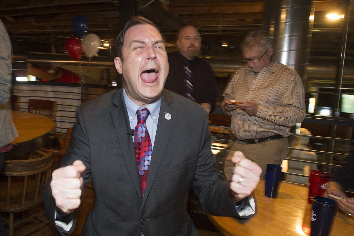 As early results come in, Spokane City Council President Ben Stuckart celebrates a commanding lead over challenger John Ahern Tuesday night at Davids Pizza. COLIN MULVANY colinm@spokesman.com (Colin Mulvany / The Spokesman-Review)