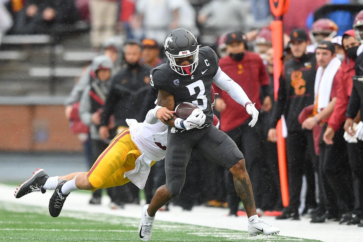 Washington State Cougars defensive back Daniel Isom (3) runs the ball off an interception against the USC Trojans during the first half of a college football game on Saturday, Sep 18, 2021, at Martin Stadium in Pullman, Wash.  (Tyler Tjomsland/The Spokesman-Review)