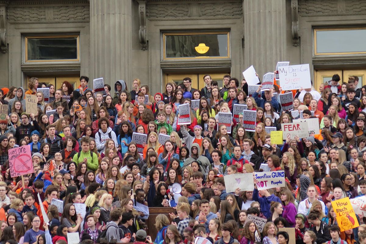 Crowds of Idaho high school and junior high students rally against gun violence in front of Idaho’s state Capitol on Wednesday, March 14, 2018. (Betsy Z. Russell / The Spokesman-Review)