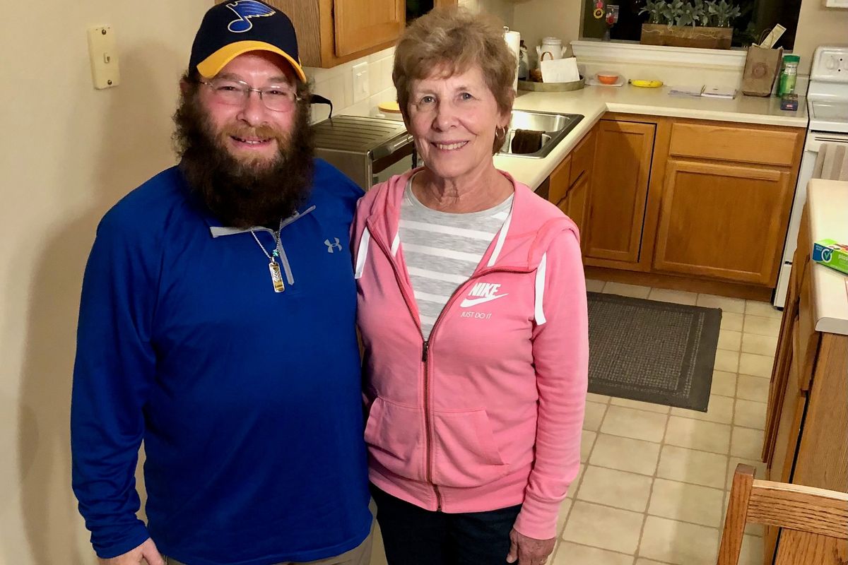 Arnie Dienoff with Jeannie Wolf in St. Charles, Mo. Dienoff tracked down funeral plans for Wolf’s mother that had blown away in the wind.  (Courtesy of Natasha Wolf)