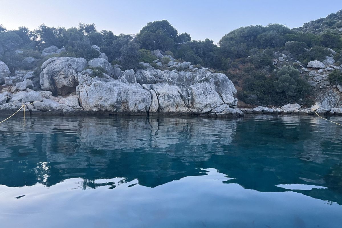 The sun rises off the shores of the Greek island of Peristera.  (Ammi Midstokke)