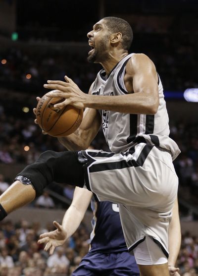 San Antonio Spurs’ Tim Duncan had 21 points in the first half. (Associated Press)