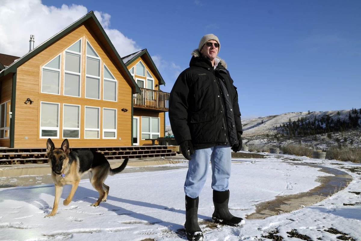 Greg Tudor, seen with his dog Mattie, wrote a letter to the Kittitas County Planning Department protesting proposed turbines. (Dan Pelle)