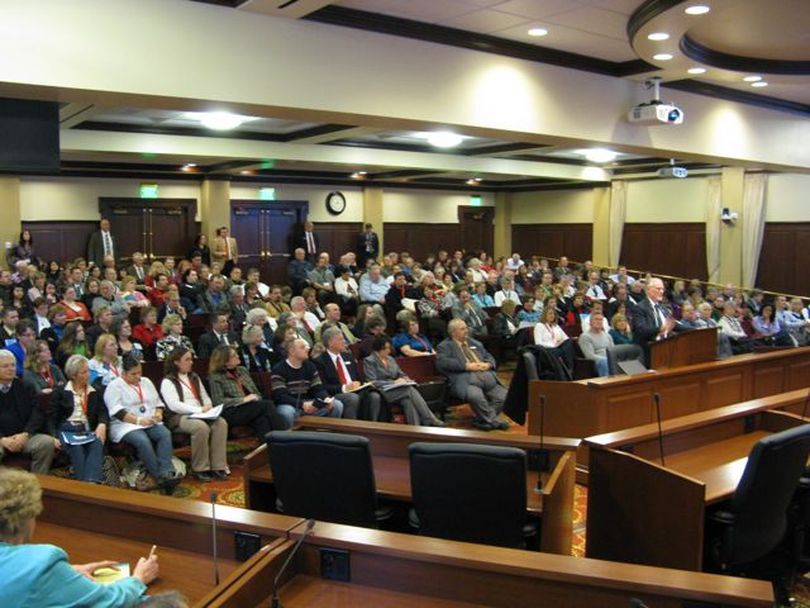 About 200 school board members from throughout the state filled the Senate Education Committee meeting on Thursday afternoon. The president of the Idaho School Boards Association, Wayne Freedman, told lawmakers that school districts need maximum flexibility to cope with looming budget cuts. (Betsy Russell)