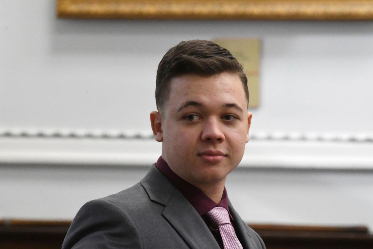 Kyle Rittenhouse waits for the start of his trial at the Kenosha County Courthouse in Kenosha, Wis., on Tuesday, Nov. 9, 2021. Rittenhouse is accused of killing two people and wounding a third during a protest over police brutality in Kenosha, last year.  (Mark Hertzberg/POOL)