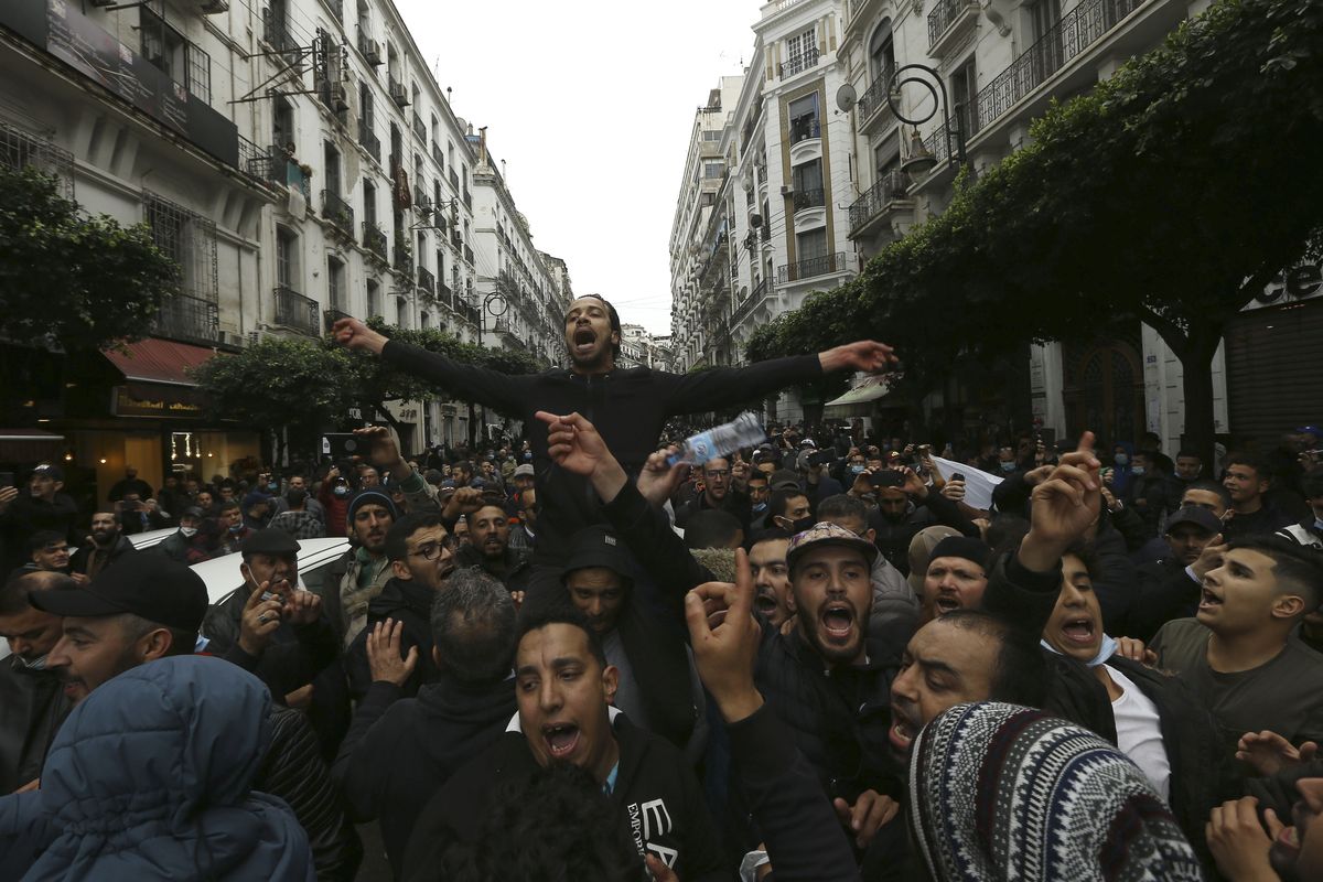 Algerians demonstrate in Algiers to mark the second anniversary of the Hirak movement, Monday Feb. 22, 2021. February 22 marks the second anniversary of Hirak, the popular movement that led to the fall of Algerian President Abdelaziz Bouteflika.  (Anis Belghoul)