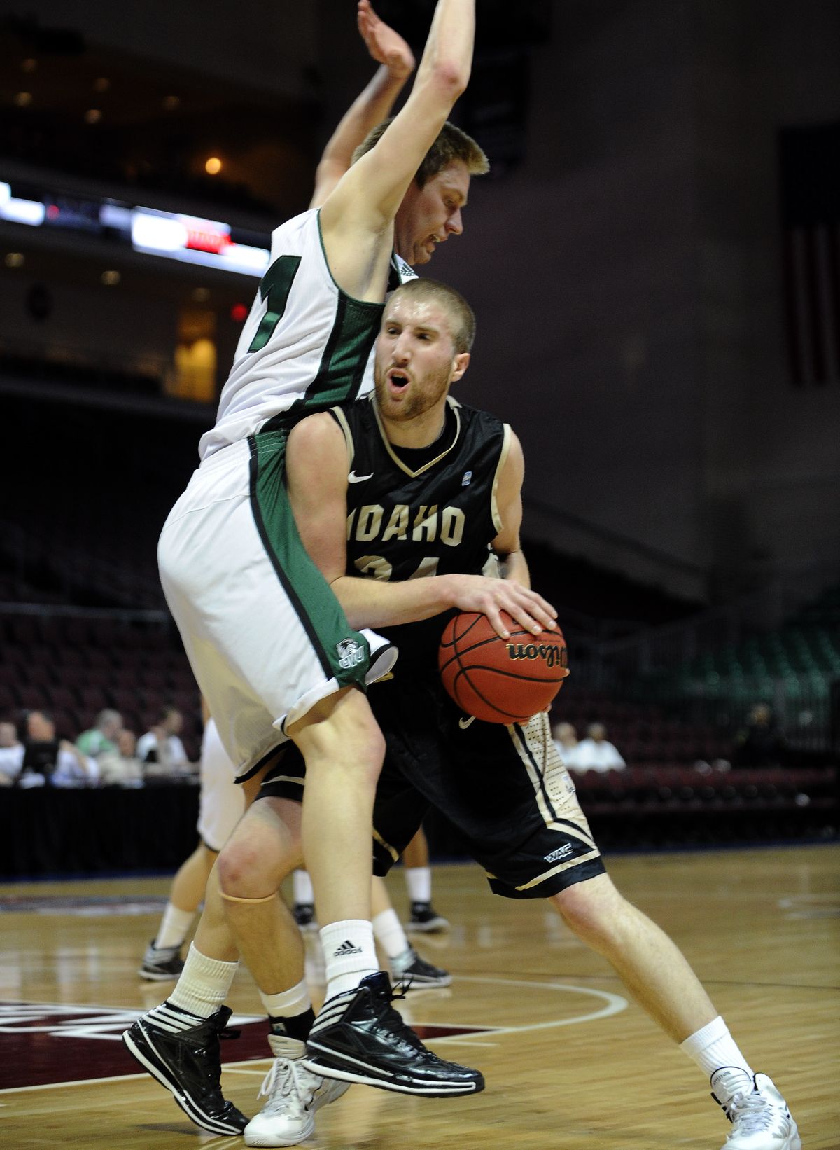 UI’s Stephen Madison, right, had 25 points in semifinal win. (Associated Press)
