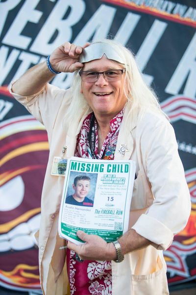 The overall mission of Fireball Run, Paul Nigh said, is to raise awareness about America’s missing children. The drivers never leave their cars without an informational poster. (Courtesy)
