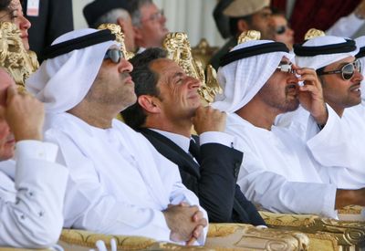 United Arab Emirates’ Crown Prince Sheik Mohamed bin Zayed Al Nahyan, second right, and French President Nicolas Sarkozy, second left, during air show at the al Dhafra Air Base on Tuesday.  (Associated Press / The Spokesman-Review)