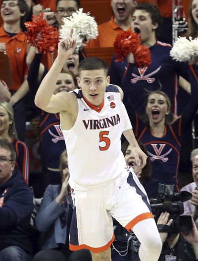 Virginia guard Kyle Guy (5) reacts to making a basket during an NCAA college basketball game against Louisville, Wednesday, Jan. 31, 2018, in Charlottesville, Va. (Andrew Shurtleff / Associated Press)
