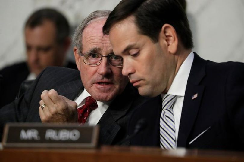 Sens. Jim Risch, R-Idaho, left, and Marco Rubio, R-Fla., confer during the Senate Intelligence Committee's hearing on Tuesday, June 13, 2017, as U.S. Attorney General Jeff Sessions testifies. (AP /  J. Scott Applewhite)