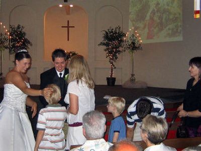 
Amy Stephens and John Daniel Beaunaux wed in Coulee City on Saturday. Everyone in the small town was invited to the wedding.
 (Photo courtesy   of Tony Wadden / The Spokesman-Review)