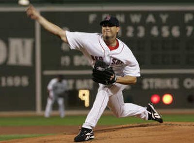 Boston pitcher Josh Beckett continued his postseason mastery with a four-hit shutout of the Angels. Associated Press
 (Associated Press / The Spokesman-Review)