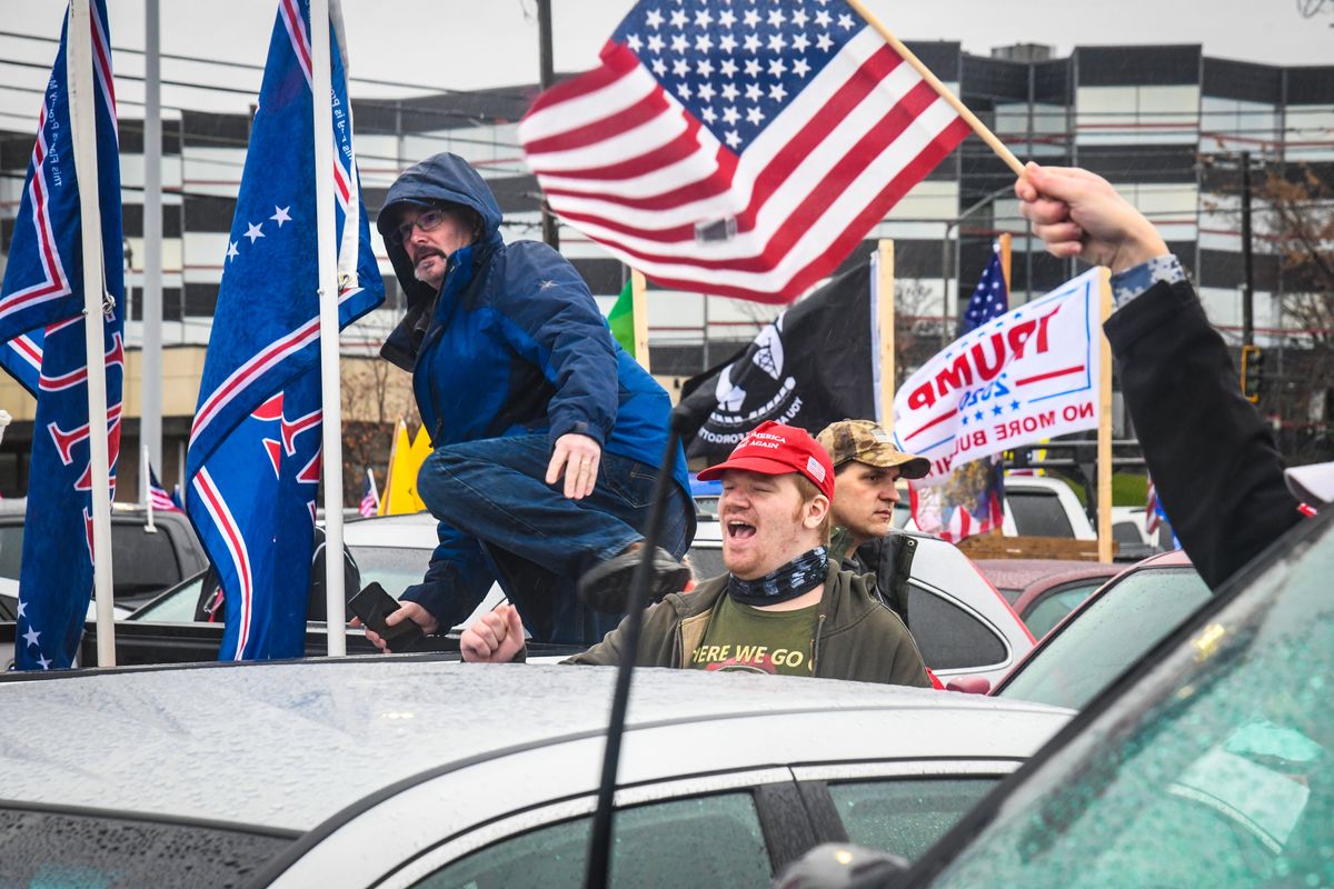 Participants gather in the Spokane Arena parking lot for the SAVE the REPUBLIC-STOP the STEAL PROTEST to support President Donald Trump, Wednesday, Jan. 6, 2021, in Spokane.  (DAN PELLE/THE SPOKESMAN-REVIEW)