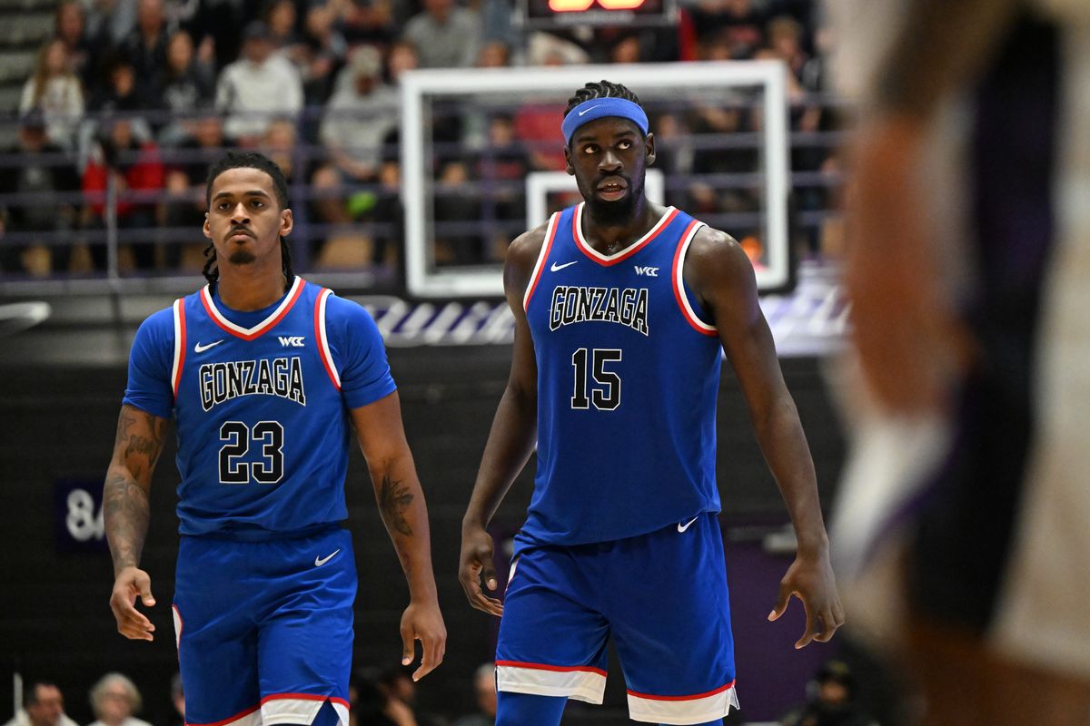 Gonzaga guard Adam Miller, left, and forward Graham Ike seem dismayed during a West Coast Conference game against Portland on Wednesday in Portland.  (Tyler Tjomsland / The Spokesman-Review)