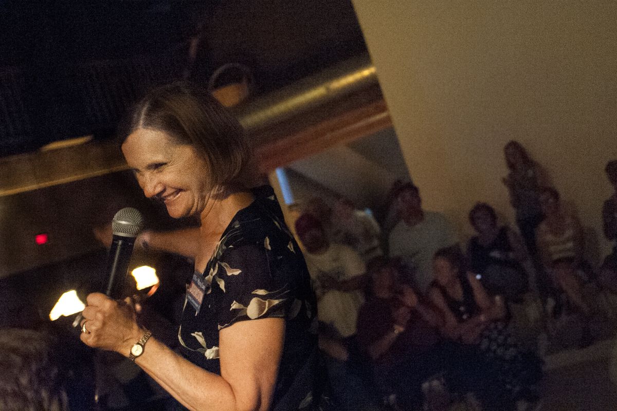 Democrat Mary Lou Johnson reacts Tuesday night during a party at Hamilton Studios in Spokane after learning she leads the race for Spokane County Commissioner District 3. She will advance to the November general election against Republican Al French. (Tyler Tjomsland)