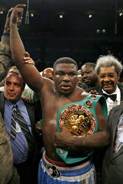 
Samuel Peter retained his belt after beating Jameel McCline.Associated Press
 (Associated Press / The Spokesman-Review)