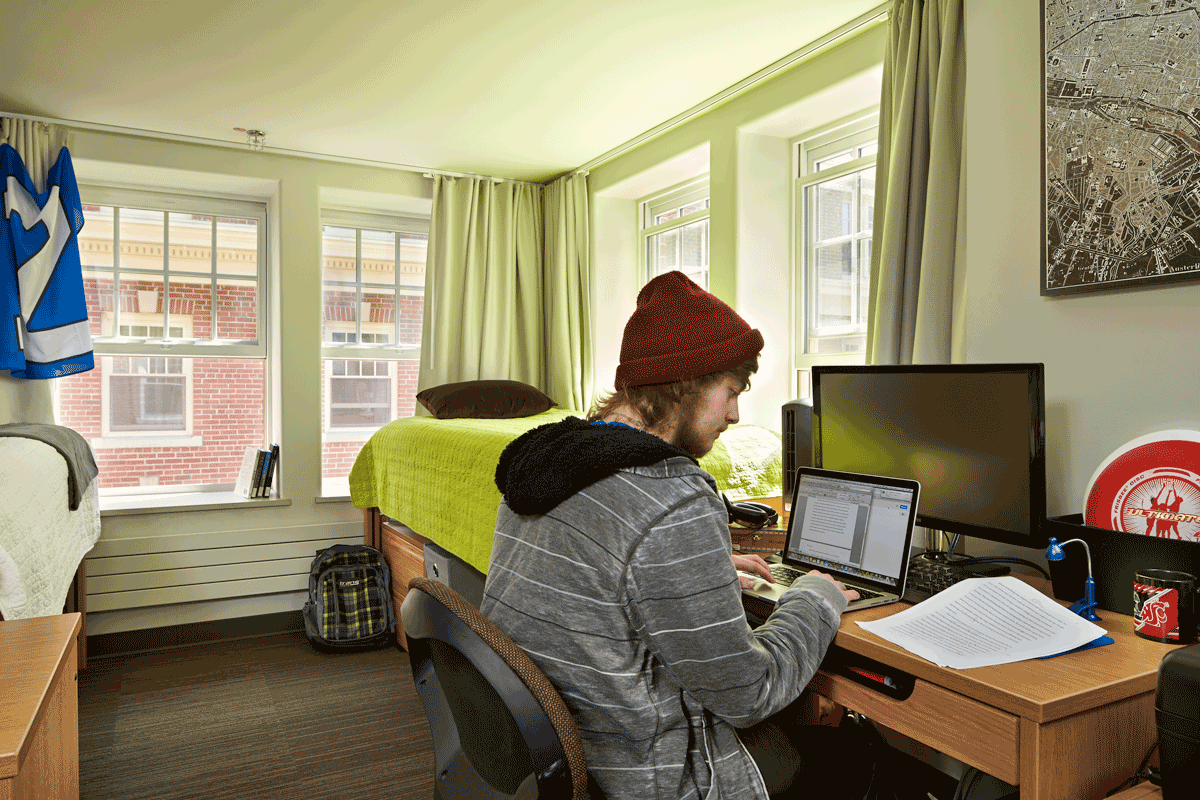 This photo, published on Washington State University’s website, shows a bedroom in Community/Duncan Dunn Hall, where freshman Matthew Gray fell out of a second-story window in August 2017. His father, Jim Gray, believes some windows in the building are a safety hazard. (Washington State University)