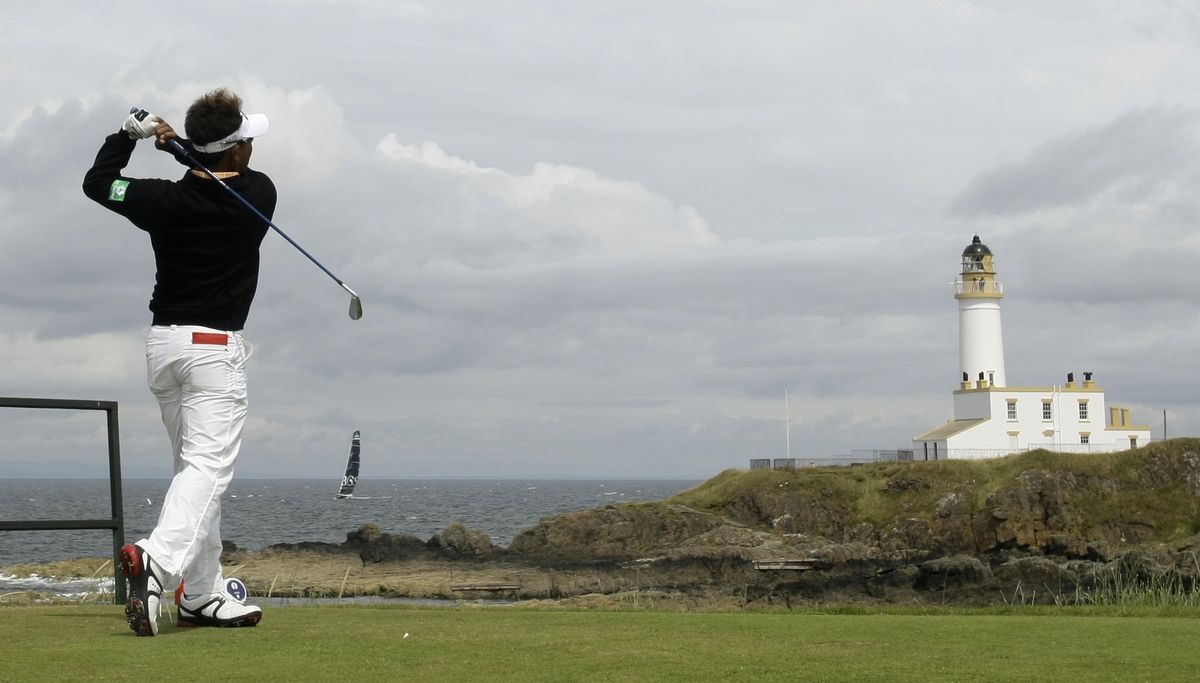 Thongchai Jaidee of Thailand drives a ball from the ninth tee during the third round of the British Open.  (Associated Press / The Spokesman-Review)