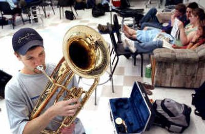 
Coeur d'Alene High School senior Nick Wilson practices his baritone euphonium in the music room at Coeur d'Alene High School. 
 (Kathy Plonka / The Spokesman-Review)
