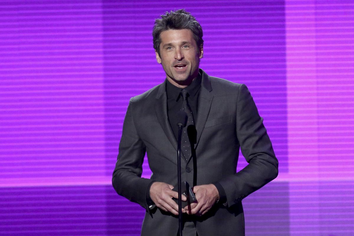 In this Nov. 23, 2014 file photo, Patrick Dempsey presents the award for pop/rock band, duo or group on stage at the 42nd annual American Music Awards in Los Angeles. (Matt Sayles / Associated Press)
