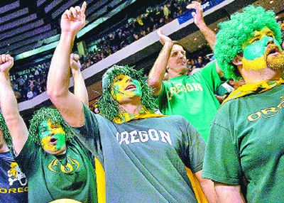 
Oregon faithful watch the final seconds of their team's victory over Miami of Ohio.
 (Brian Plonka / The Spokesman-Review)