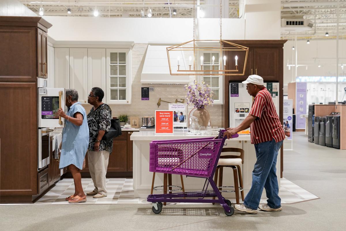 People shop at a new Wayfair store in Atlanta in May.  (Megan Varner/Bloomberg)