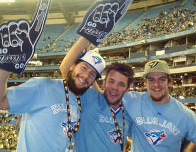 Trevor Glass, from left, Justin McCrae and David Rutherford take advantage of a day off to attend a Blue Jays game.Courtesy of Spokane Chiefs
 (Courtesy of Spokane Chiefs / The Spokesman-Review)
