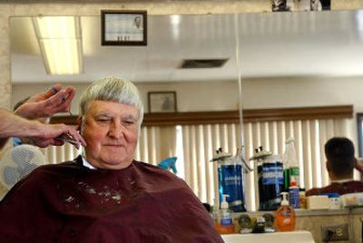 
Wheat farmer Irvin Sobek gets a trim at Dan's Barber Shop in North Spokane. Sobek travels from his Palouse farm several times a year to take care of loose ends in the city.
 (Photos by Brian Plonka/ / The Spokesman-Review)