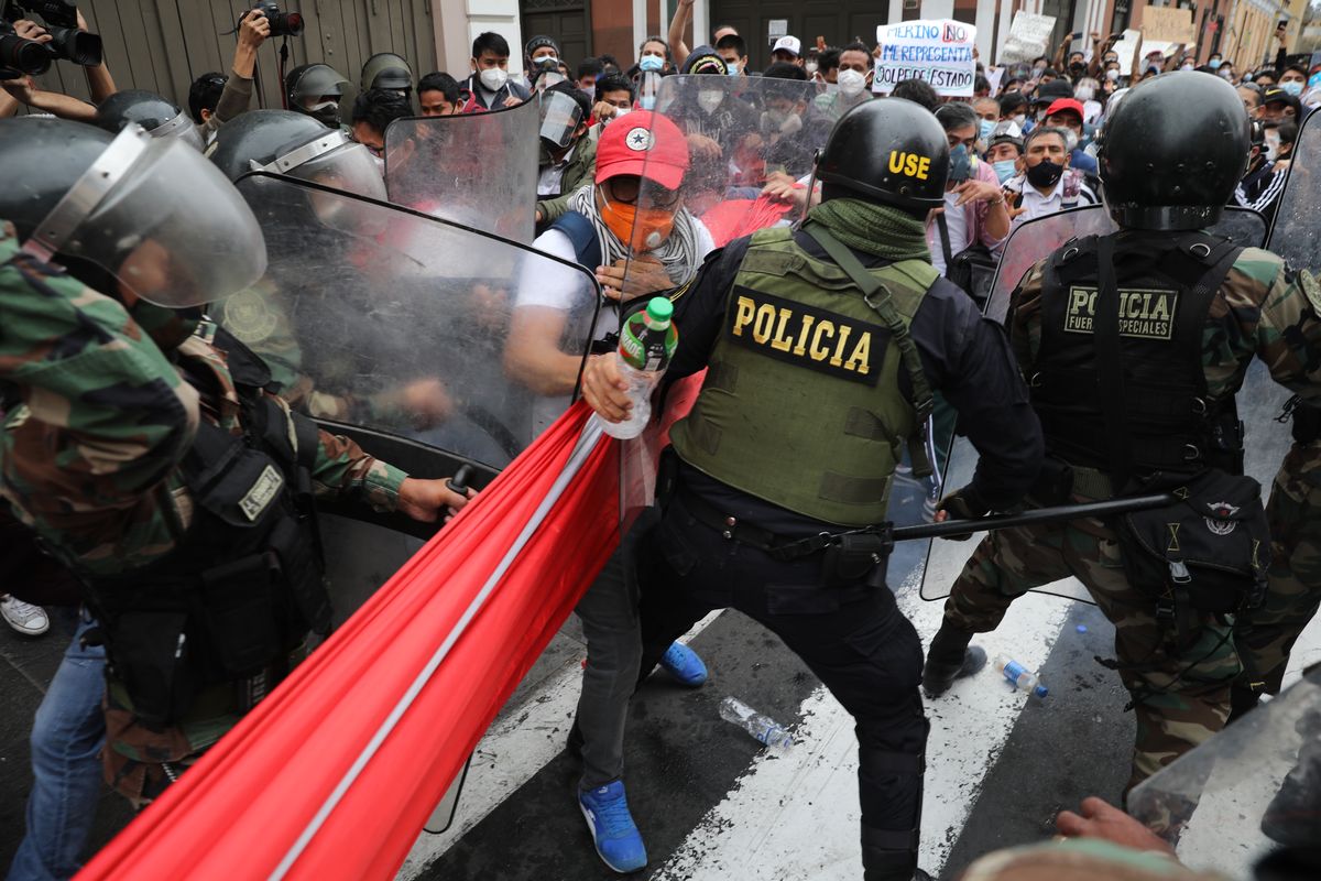 Police block supporters of former President Martin Vizcarra from reaching Congress as lawmakers swear-in Manuel Merino, head of Peru