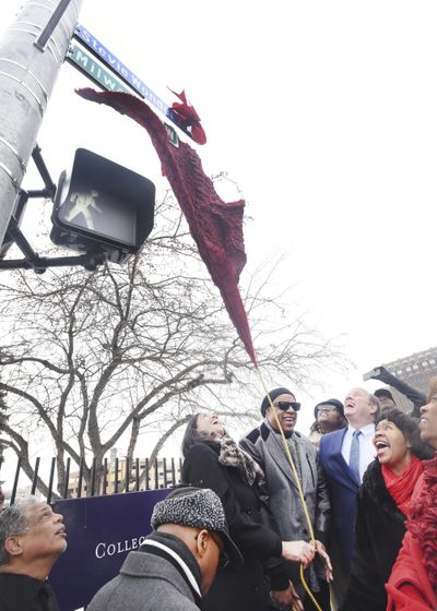 Motown legend Stevie Wonder unveils the new street sign “Stevie Wonder Ave.” along with Motown Museum chairwoman Robin Terry, Detroit Mayor Mike Duggan, City Council President Brenda Jones and Congresswoman Brenda Lawrence. during a ceremony in Detroit, Wednesday, Dec. 21, 2016. A portion of Milwaukee Street was renamed Stevie Wonder Avenue. (Daniel Mears / AP)