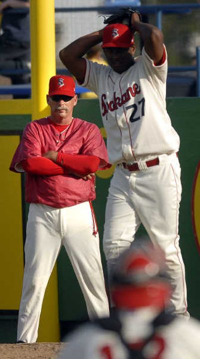 
Spokane Indians pitching coach Keith Comstock keeps a watchful eye on Tuesday's starter, Fabio Castillo.
 (The Spokesman-Review)